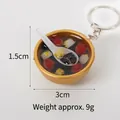 Miniature food keychain featuring a realistic gold bowl with black sesame soup dessert - 3cm Gold Bowl-No.13 (Keychain)