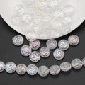 Macro shot of iridescent spiral crystal glass beads for DIY jewelry making and crafts - AB White