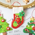 Three 3D polymer clay Christmas ornaments with festive tree and stocking designs - Cane Christmas Sock
