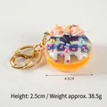 Mini macaron dessert keychain in purple and yellow with measurements 4.5cm diameter - D14 Blue - Gold 8-clasp