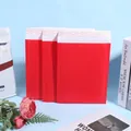 Vibrant red waterproof bubble mailers with secure self-adhesive seal for shipping - 18x23+4cm / Red