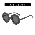 Kids flower-shaped round sunglasses in matte black with dark lenses for sun protection - Matte Black Green Frame Grey Lens