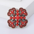 Vintage gold alloy flower brooch with red pearls and rhinestones in clover design - Red