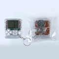 Mini transparent game player keychain set with front and back view of the handheld console - Clear White