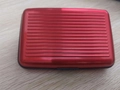 Waterproof red aluminum credit card holder with RFID protection and anti-slip texture - Orange