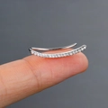 Silver curved ear crawler with micro-p鑲 cubic zirconia stones shown on fingertip - Silver (Ear Crawler)