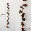 Ghirlanda natalizia con pigne, bacche rosse e aghi di pino, lunghezza di 100 centimetri - Stringa di Pigne da 100CM