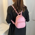 Mini zaino rosa minimalista da donna in ecopelle con texture raffinata - Rosa