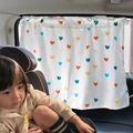 Car window sunshade with colorful heart pattern installed for child protection - Colorful Heart Print