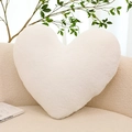 Plush heart-shaped throw pillow in white color resting on a soft beige armchair - White / 40CM