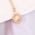 Macro view of gold stainless steel necklace with sunburst oval natural stone pendant - 4# Pink (Pink-Orange Shell Luster)
