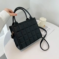 Classic black quilted leather handbag with gold hardware and a detachable shoulder strap - Black