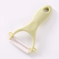 Kitchen ceramic peeler with light yellow ergonomic handle and sharp white blade - Ceramic Blade-Nordic Green