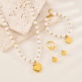 Elegant gold heart jewelry set including pearl necklace, bracelet, ring, and earrings - Pearl Heart Style