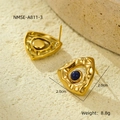 Detailed view of gold triangular earrings with hammered texture and blue natural stone - Gold with Blue Stone (NMSE-A811-3)