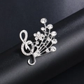 Silver musical note brooch with sparkling rhinestones and elegant G-clef fountain design - Radiant Music Note Silver (XD9119-2)