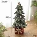 Weihnachtsbaum-Figur aus Harz mit Schneepunkten und rotem Geschenkkarton-Sockel - Kleiner Weihnachtsbaum