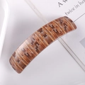 Macro view of French tortoiseshell acetate barrette with mosaic wood grain pattern - 28# Spring Clip (Brown Mosaic Woven)