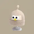 Detail of knit baby beanie with funny cartoon eyes and unique pointed top design - Bird Hat Beige (2 Months - 2 Years Old)