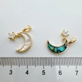 Detailed size view of 18k gold moon and star pendants with shell and abalone inlay - Moon (White Mother of Pearl)