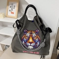 Close-up of vibrant tiger head embroidery and braided rope handle on grey nylon tote bag - Gray Tiger - New (Without Shoulder Strap)