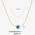 Halskette aus goldenem Edelstahl mit himmelblauem runden Zirkonia Anhänger - März