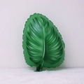 Green monstera leaf shaped foil balloon for Hawaiian themed party decorations - Green Monstera Leaf