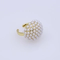 Close-up of adjustable gold open ring featuring elegant white round pearls on the band - Gold Round Cluster Pearl-E