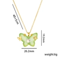 Collier papillon vert clair doré avec pierre précieuse en forme de cœur et détail d'étoile - Vert