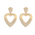Orecchini a cuore dorati con design a sbalzo e pietre in zircone brillanti da donna - Oro