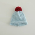 Detail of light blue knit hat with red pom-pom and rolled cuff for children - 3-8 Years / Lake Blue (Red Pom)