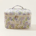 Quilted makeup bag with blue floral patterns, top handle and double zipper closure - 25*16*13cm / Green Flower / 【product Attributes】this Is A Cosmetic Bag With A White Background And Blue And Orange Floral Pattern. It Features A Diamond Quilting Technique A Top Handle And A Double Zipper Closure. The Material Appears To Be Fabric. There Is No Specific Size Or Specification Information. 【visual Presentation】the Image Is A Professional Still Life Photograph With A Clean And Tidy Background Natural And Soft Lighting Highlighting The Product's Texture And Pattern Details. The Image Quality Is High Due To Its Sharpness And Accurate Exposure. The Aesthetic Appeal Is High Due To Its Professional Composition Harmonious Colors And Strong Visual Appeal. 【text Content】the Front Of The Bag Has A Beige Fabric Label With The English Text "today Mood Feel The Warm. In Our Daily Life And The Mood." There Are No Other Logos Watermarks Or Certification Marks. 【review Conclusion】the Image Meets The Requirements And Is Approved For Direct Use. 【logistics Label】none. 【infringement Risk】brand - None Probability [0.1] Because The Design Style Is Common And There Are No Obvious Brand Logos Or Signs Of Imitation. 【product Parameters】the Identified Information Includes Design Features Such As Floral Patterns Quilting Textures Handles And Zippers.