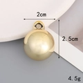 Detail of 2cm UV gold plated heart-shaped bead with glossy mirror finish and integrated loop - 20mm*25mm Round Bead / Gold
