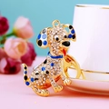 Sparkling rhinestone dog keychain with blue enamel and crystal accents in gold finish - Classic Dalmatian Blue