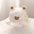 Dettaglio cappello sole neonato in cotone bianco con orecchie d'orso 3D e stampa - 48cm (5-18 mesi) / Blu