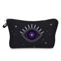 Detail view of durable black makeup bag featuring iconic evil eye pattern and side handle - Black Purple Eye 657