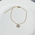 Delicate 18K gold plated bracelet featuring a sparkling zircon initial W pendant - Letter W