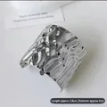 Molten lava texture silver metal hair clip with 3.8cm length and 4cm diameter dimensions - Hammered Silver