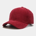 Detail view of the wine red corduroy baseball cap showing textured fabric and curved brim - Burgundy
