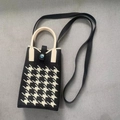 Knitted crossbody phone bag with black and white houndstooth pattern and beige handle - Houndstooth Black