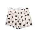 Close-up of white high-waist shorts with black polka dots showing detailed fabric texture - Bottoms