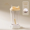 Detail of 710ml cream-colored Tritan cup with retractable straw for boba pearls - 24oz / Cream
