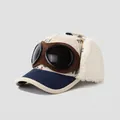 Close-up of kids' winter aviator hat featuring corduroy fabric and pilot goggles detail - 52cm (2-5 Years) / Dinosaur Print-Navy Blue