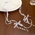 Detailed view of pearl necklace with pink polka dot bows and clear crystal charms - Necklace-White-Pink Polka Dot