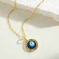 Golden Evil Eye necklace with colorful stones and blue enamel pendant on white stone base - Round Evil Eye Style (XL3159-3)