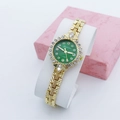 Montre élégante dorée pour femme avec cadran vert émeraude et lunette en cristal - Vert