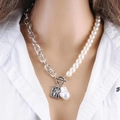Detail of layering necklace with baroque pearl and silver square pendant on a white shirt - Pearl Single Layer Silver