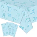 Dettaglio tovaglia azzurra con fiocchi blu scuro e stelle bianche per feste ed eventi - Blu
