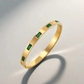 Detail of 18k gold plated titanium steel bangle with five emerald-cut green zircons - Gold Style With Green Rhinestone (30乙-A-3金+绿钻手镯)