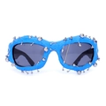 Blue punk sunglasses with silver studs and spikes decoration on a white background - Blue